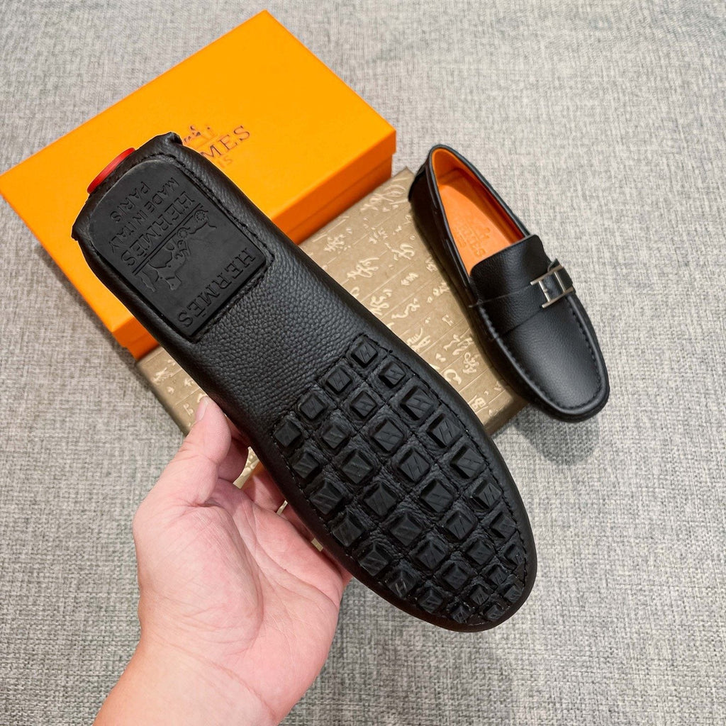 Hermès Black Bar Loafers — side