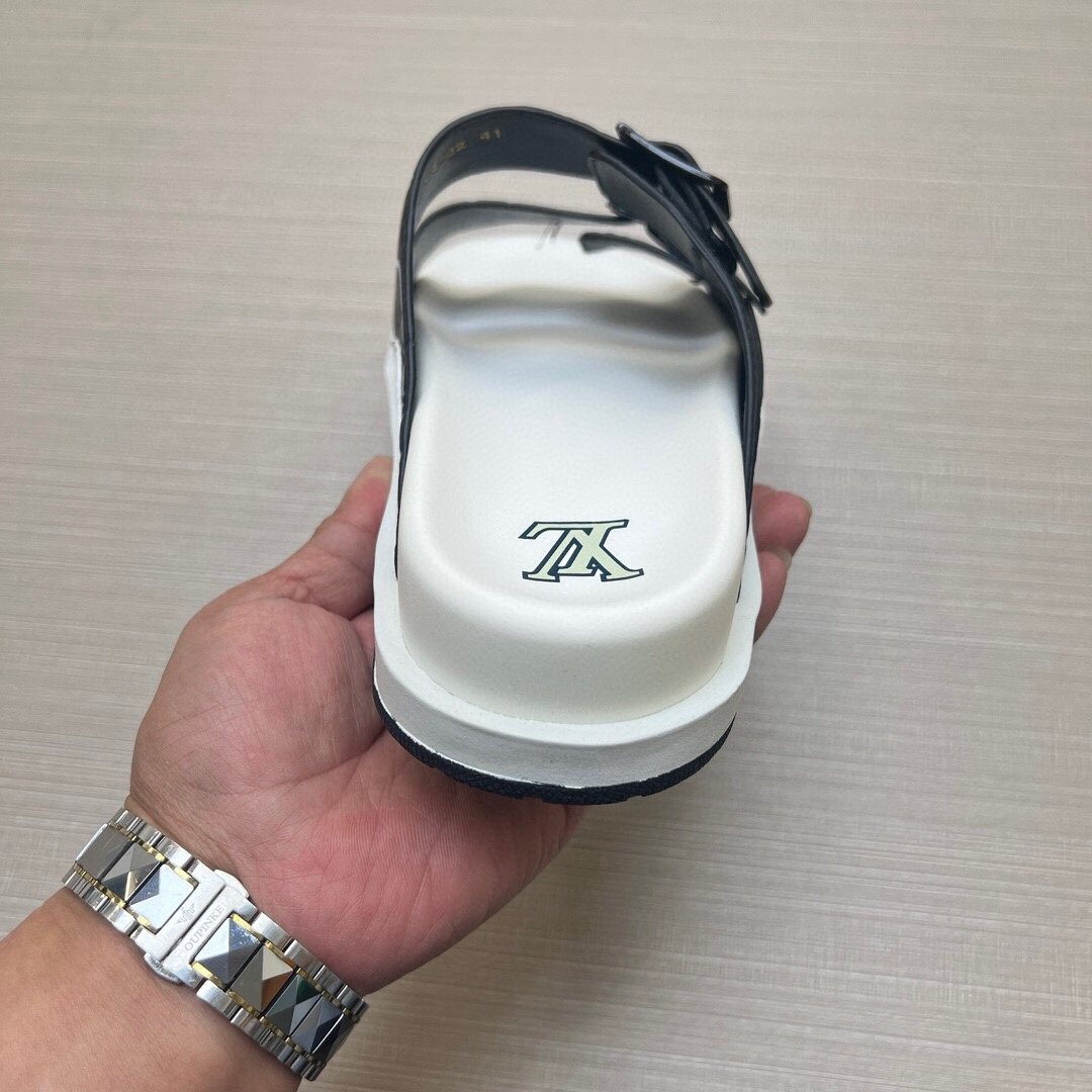 Louis Vuitton Double-Buckle Slide Sandals — model